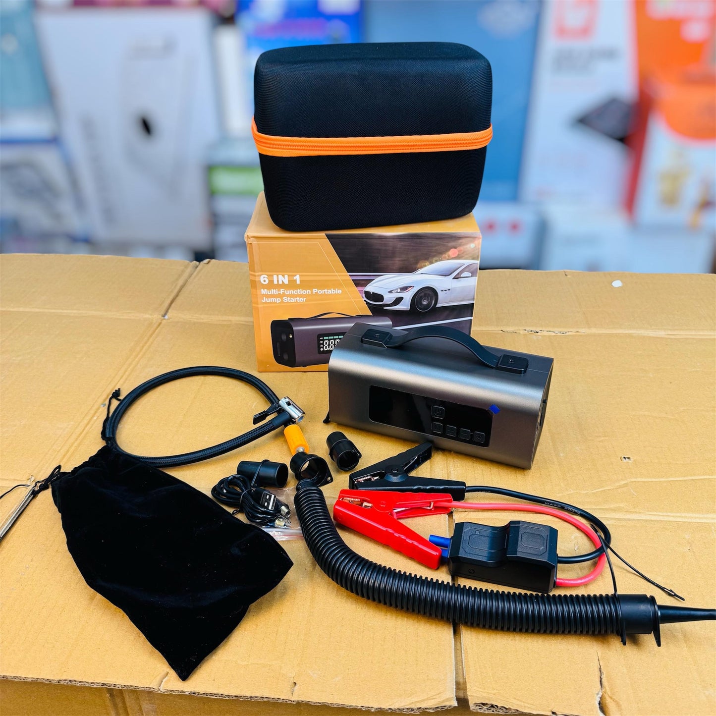 EK-20008 Portable Jump Starter – 6-in-1 Emergency Car Power Bank & Air Compressor 6-in-1 Jump Starter EK-20008 | All-in-One Roadside Emergency Kit